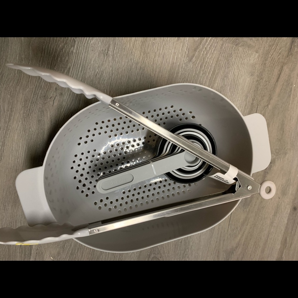 Unique shaped oval colander, measuring set, tongs